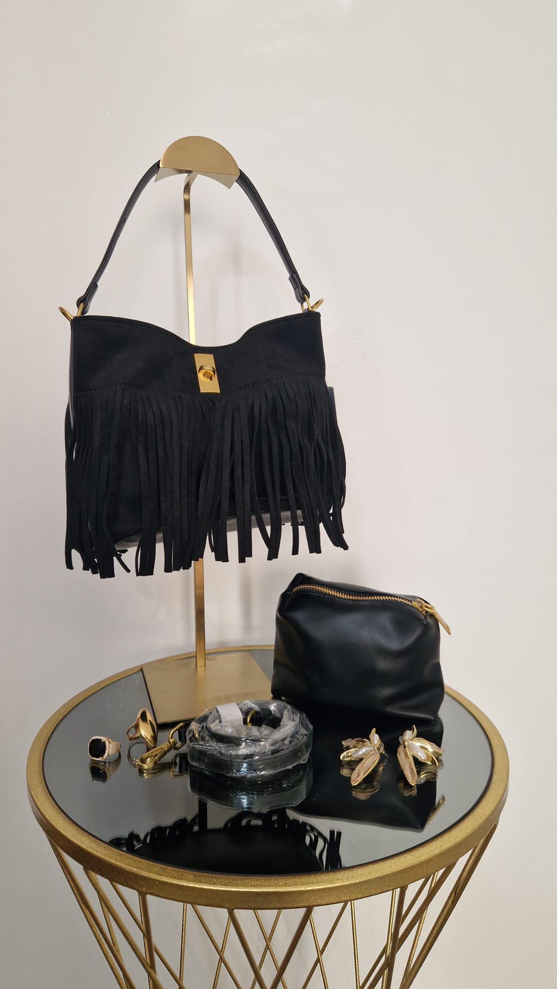 Borsa camoscio con frange.