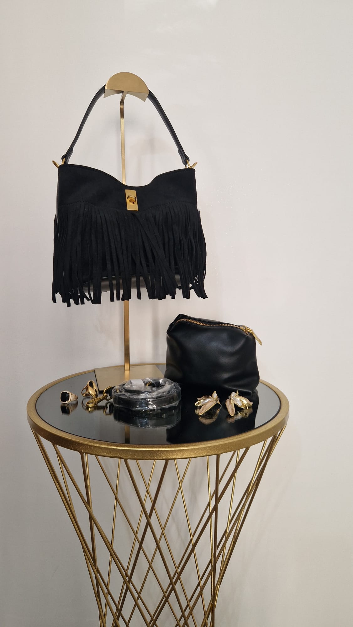 Borsa camoscio con frange.