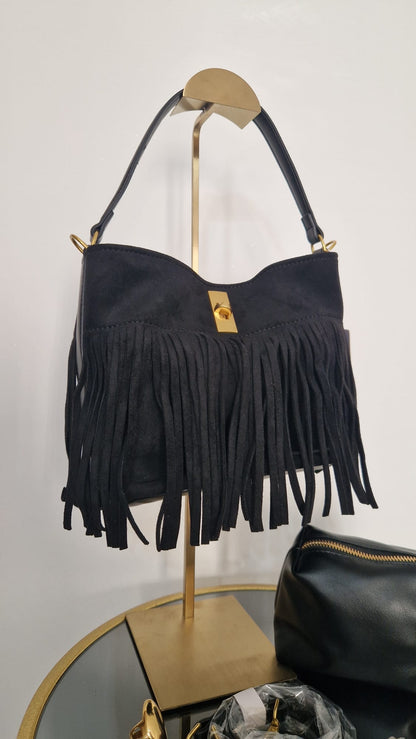 Borsa camoscio con frange.