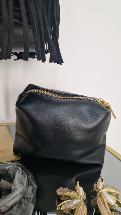 Borsa camoscio con frange.